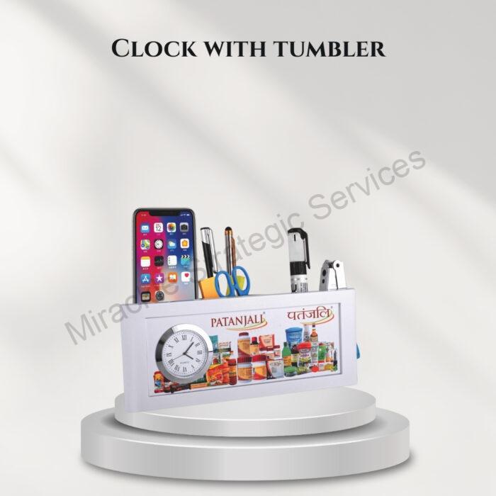Clock with tumbler